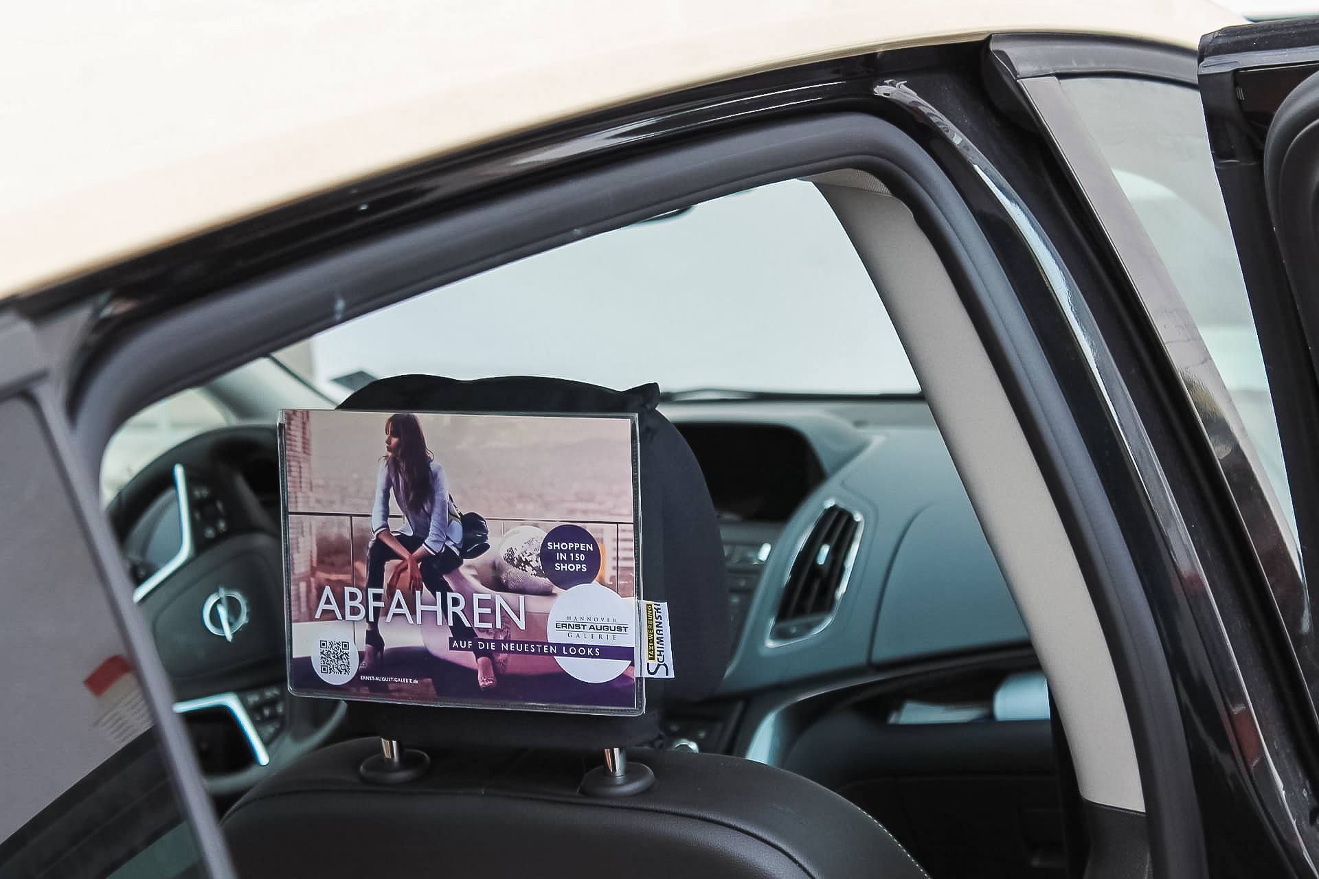 Werbung im Taxi – Kopfstützen-Plakate Beispiel